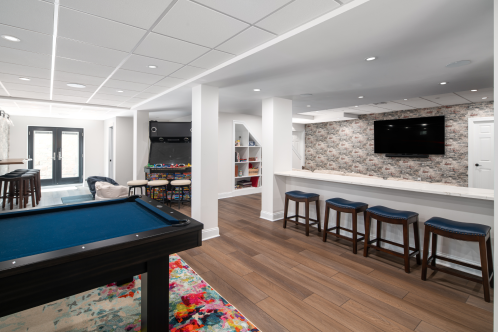 Basement remodel with bar area and pool table