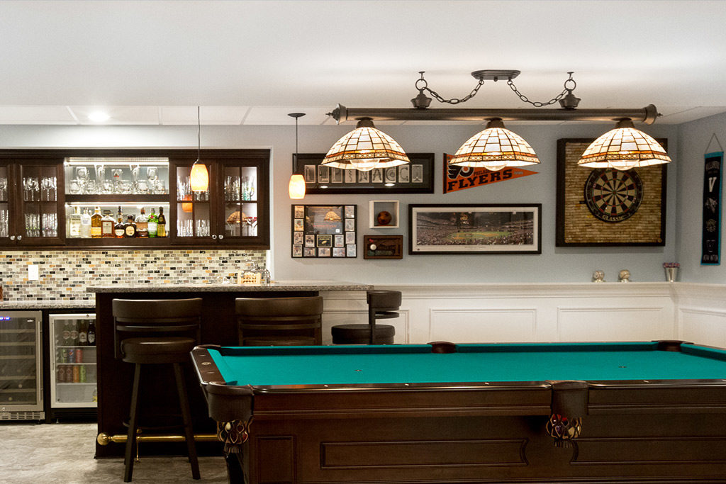 Basement Remodeling in Pennsylvania with Pool Table Bar wine fridge man cave