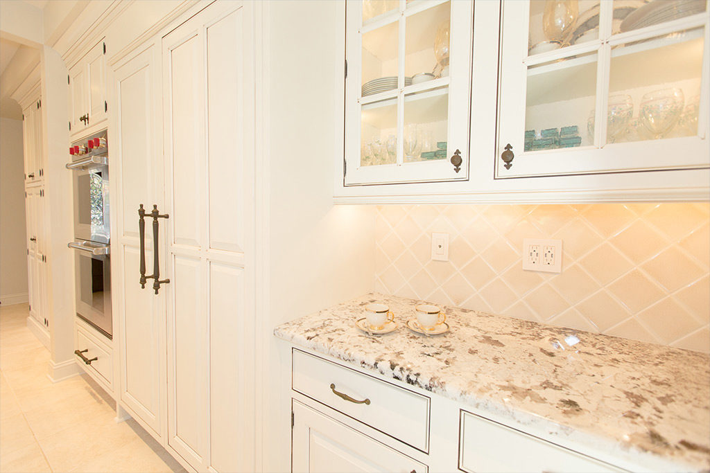 White kitchen with under-cabinet lighting