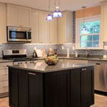 two tone cabinets with kitchen island