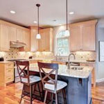 kitchen remodel with recessed lighting and tile backsplash on tall white cabinetry