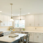 kitchen with white cabinets and quartz countertops