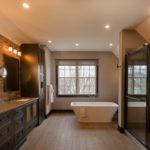 bathroom remodel with walk in shower and recessed lighting